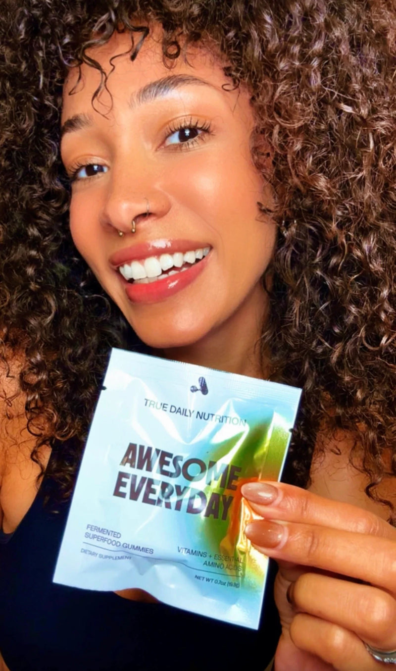 A customer smiling in a selfie