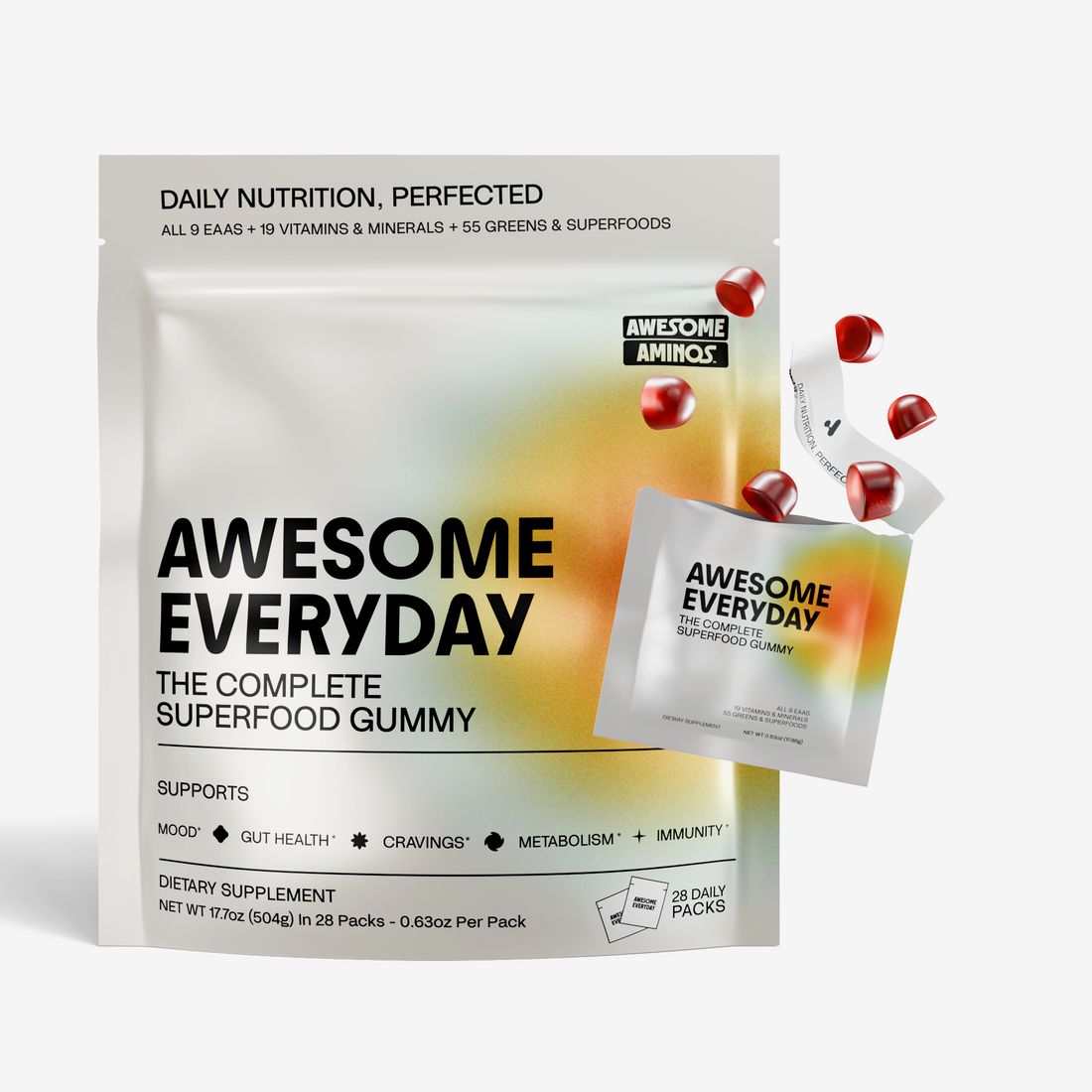 White pouch of Awesome Everyday superfood gummies with red gummies floating around the package