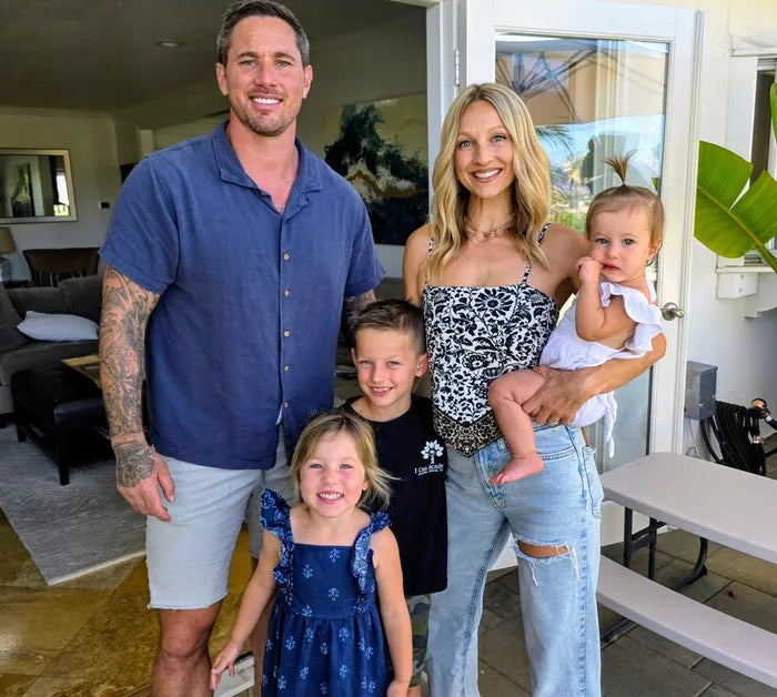 Warren with his wife Kelsey and their three children