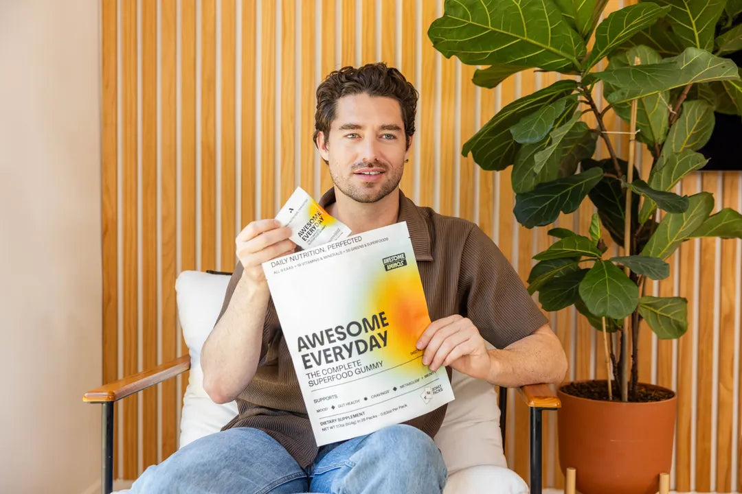 Customer holding an Awesome Everyday pack